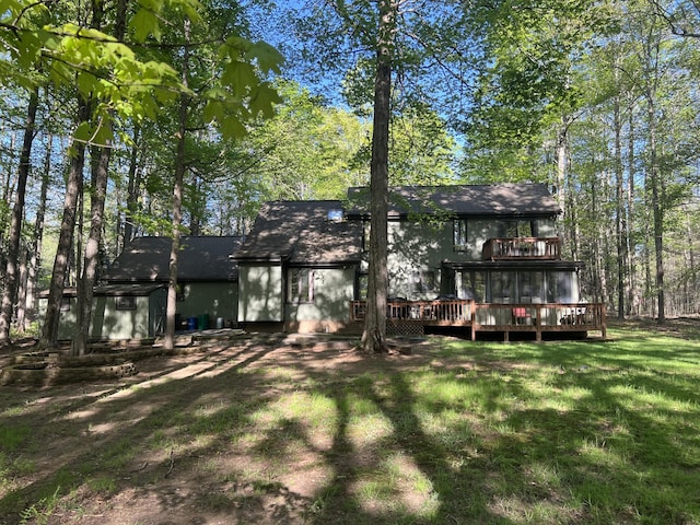 122 Sawmill Rd, Pocono Lake, PA 18347 - back of house with a deck, a lawn, a shingled roof, a shed, and a balcony