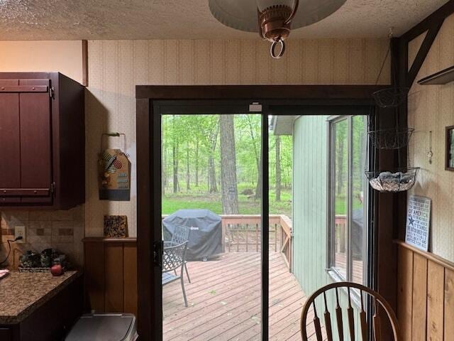 122 Sawmill Rd, Pocono Lake, PA 18347 - entryway featuring wallpapered walls, a textured ceiling, and ceiling fan