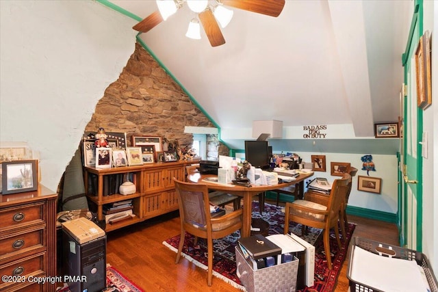 office area with lofted ceiling, wood finished floors, and a ceiling fan