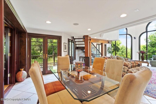 dining space featuring recessed lighting, french doors, and light tile patterned floors