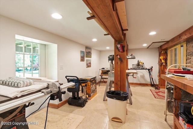 workout room featuring recessed lighting and baseboards