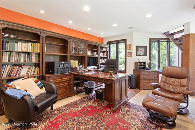 home office with light tile patterned floors and recessed lighting