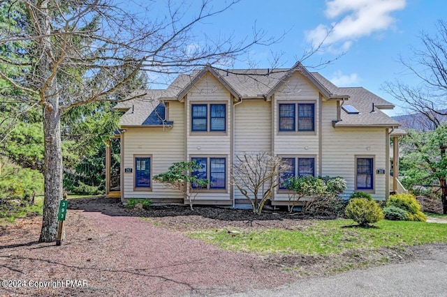 view of front of house featuring a shingled roof