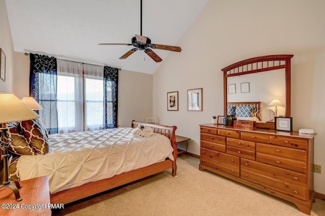 bedroom featuring carpet floors, high vaulted ceiling, baseboards, and a ceiling fan