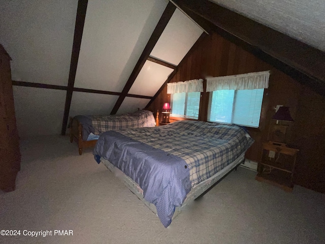 bedroom with carpet floors and lofted ceiling with beams