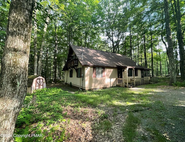 260 Partridge Dr, Pocono Lake, PA 18347 - view of home's exterior featuring a shingled roof