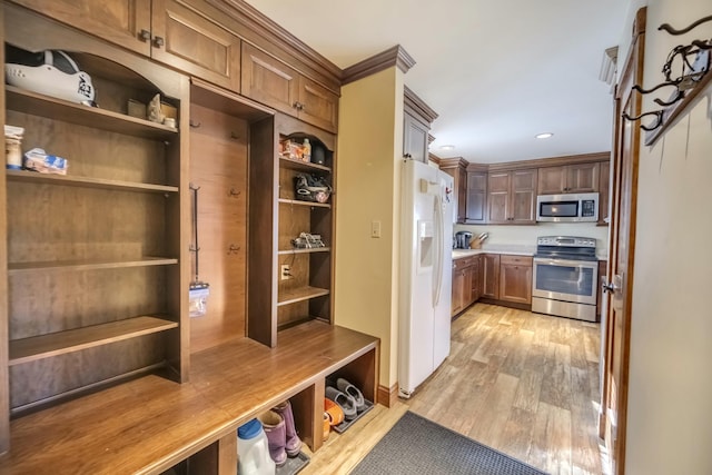 mudroom with recessed lighting and light wood finished floors