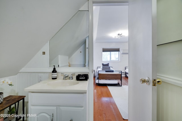3137 Fern Rd, Pocono Summit, PA 18346 - bathroom with wood finished floors and vanity