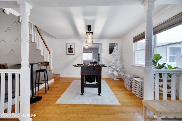 3137 Fern Rd, Pocono Summit, PA 18346 - rec room featuring plenty of natural light, light wood finished floors, crown molding, and baseboards