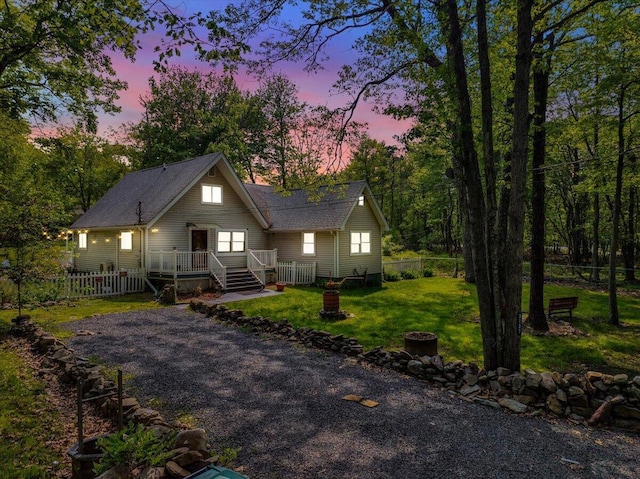 3137 Fern Rd, Pocono Summit, PA 18346 - rustic home with a shingled roof, an outdoor fire pit, and a wooden deck