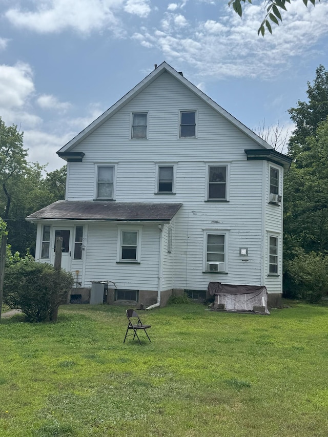 340 Brookside Ave, East Stroudsburg, PA 18301 - rear view of house featuring a lawn and a hot tub