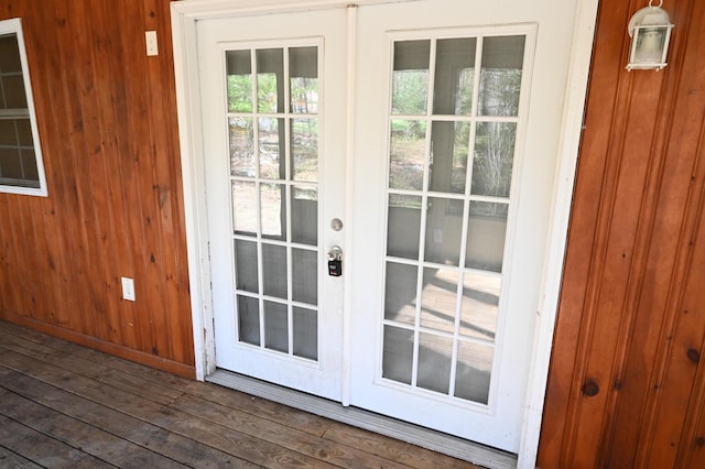 doorway with dark wood-style flooring