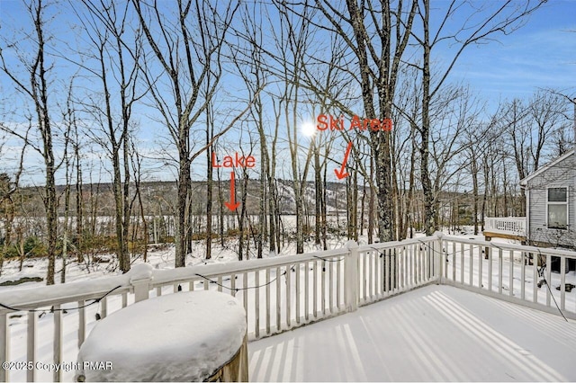 view of snow covered deck