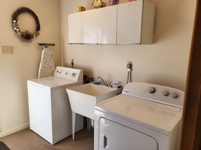 7425 W Dogwood Ln, Cresco, PA 18326 - laundry room featuring light carpet, a sink, baseboards, independent washer and dryer, and cabinet space