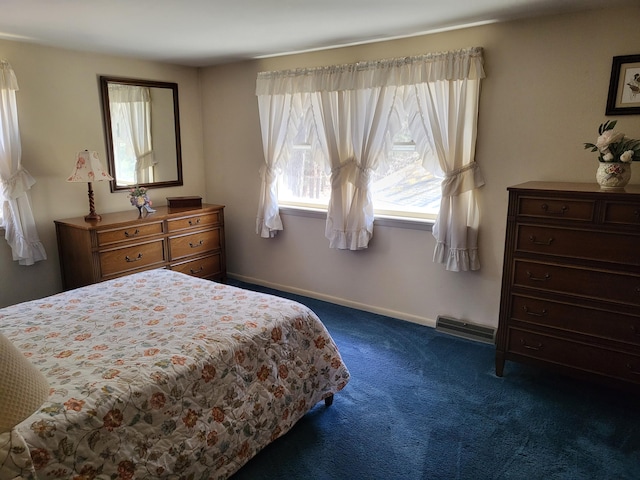 7425 W Dogwood Ln, Cresco, PA 18326 - bedroom with dark carpet, visible vents, and baseboards