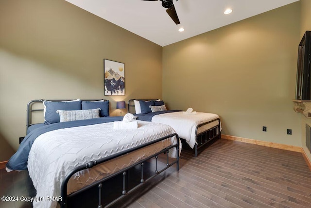 bedroom with ceiling fan, baseboards, wood finished floors, and recessed lighting