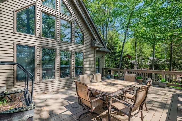 24 Glen Rd, Lake Ariel, PA 18436 - deck with outdoor dining area and view of scattered trees