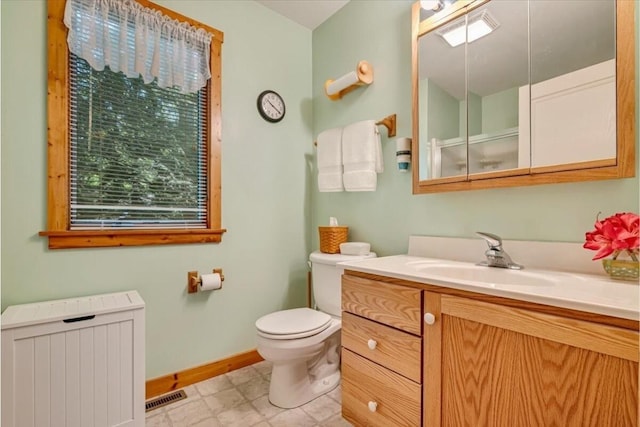 24 Glen Rd, Lake Ariel, PA 18436 - bathroom featuring toilet, baseboards, and vanity