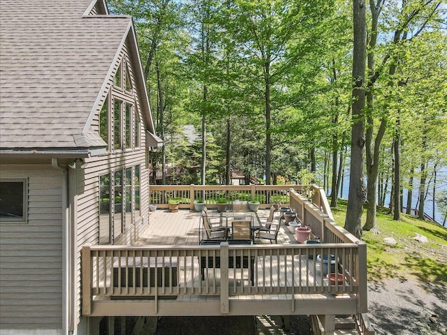 24 Glen Rd, Lake Ariel, PA 18436 - wooden terrace with outdoor dining area and view of scattered trees