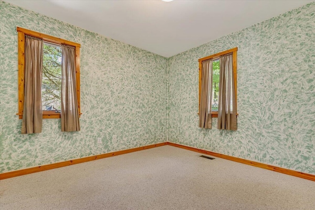 24 Glen Rd, Lake Ariel, PA 18436 - spare room with wallpapered walls, baseboards, and carpet floors