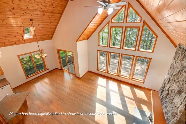 24 Glen Rd, Lake Ariel, PA 18436 - unfurnished living room with high vaulted ceiling, wooden ceiling, ceiling fan, light wood-style flooring, and a chandelier