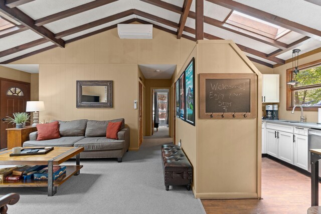 8 Big Boulder Rd, Lake Harmony, PA 18624 - living area featuring a skylight and dark wood-type flooring