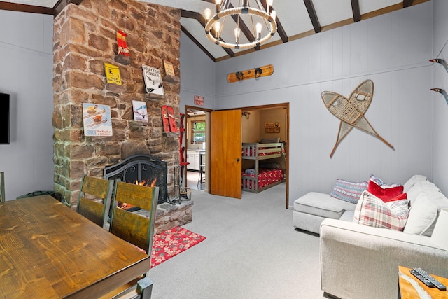 8 Big Boulder Rd, Lake Harmony, PA 18624 - carpeted living room featuring a chandelier and a stone fireplace