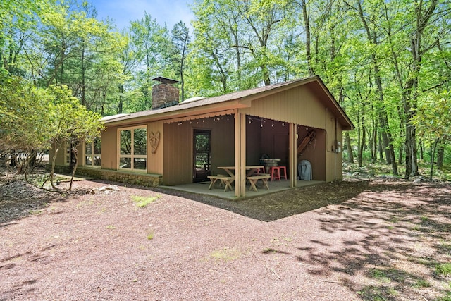 8 Big Boulder Rd, Lake Harmony, PA 18624 - exterior space with a chimney