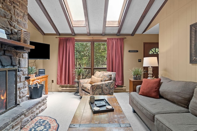 8 Big Boulder Rd, Lake Harmony, PA 18624 - carpeted living area with a stone fireplace, a baseboard radiator, and baseboard heating