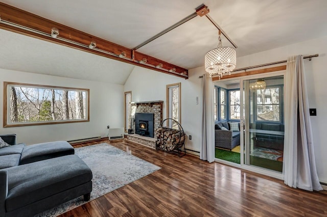 living room featuring vaulted ceiling with beams, a baseboard heating unit, baseboard heating, a fireplace, and dark wood-style flooring