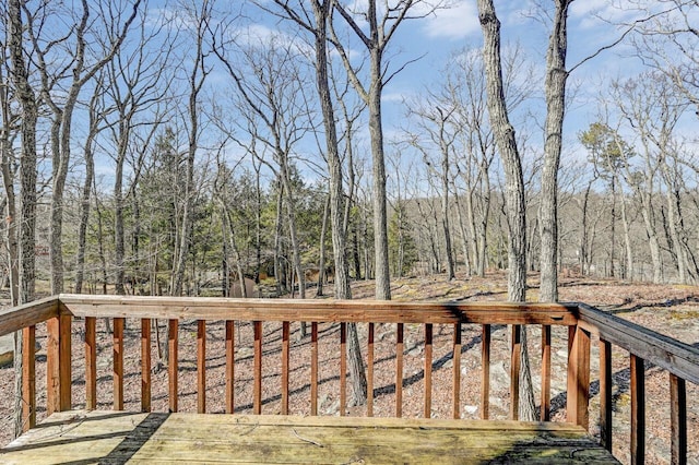 deck with a wooded view