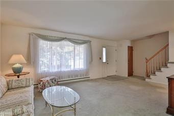 carpeted living room with stairs