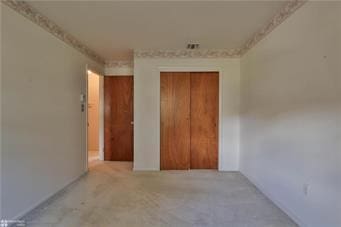 unfurnished bedroom featuring a closet