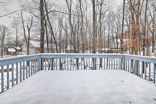 view of snow covered deck