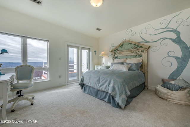 bedroom with carpet floors, access to exterior, and visible vents