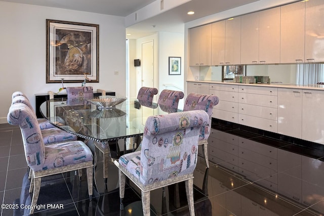 dining room featuring recessed lighting