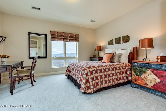 bedroom featuring carpet, visible vents, and baseboards