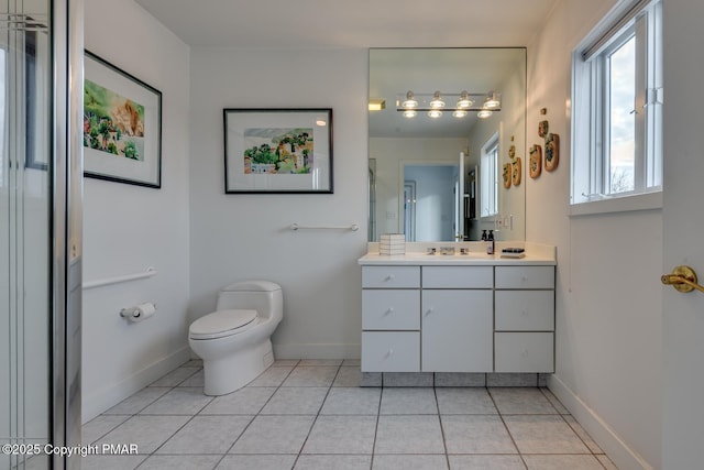 full bath featuring baseboards, vanity, toilet, and tile patterned floors