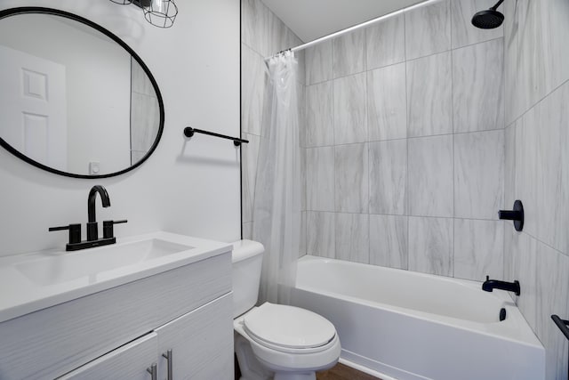 full bathroom with toilet, vanity, and shower / bathtub combination with curtain