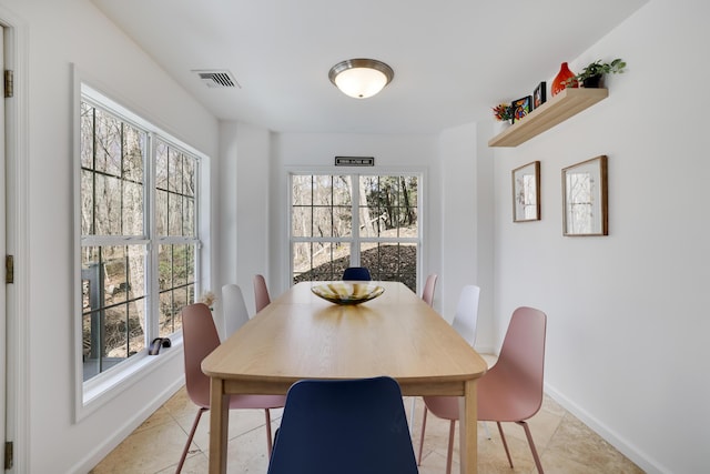 106 Alwen Ave, East Stroudsburg, PA 18301 - dining area with light tile patterned floors and baseboards