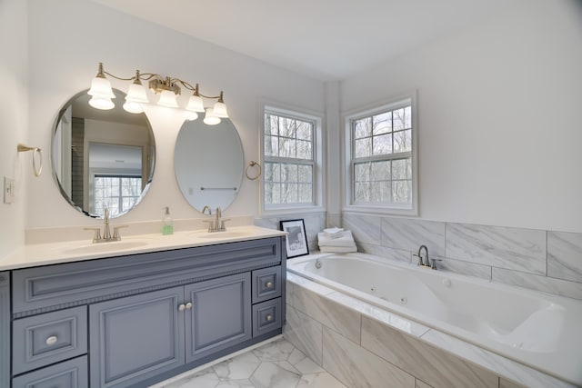 106 Alwen Ave, East Stroudsburg, PA 18301 - bathroom featuring double vanity, a whirlpool tub, and marble finish floors