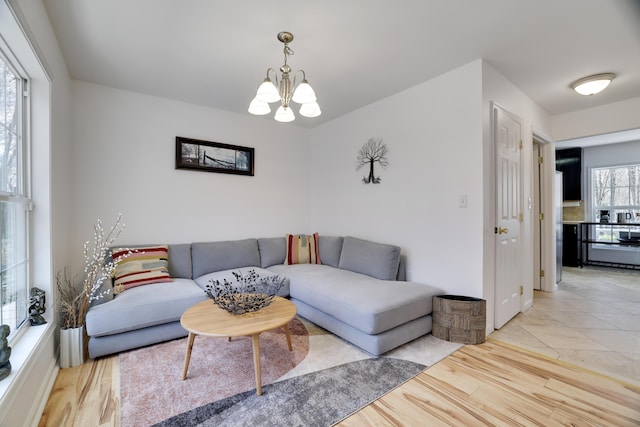 106 Alwen Ave, East Stroudsburg, PA 18301 - living area featuring a chandelier and light wood finished floors