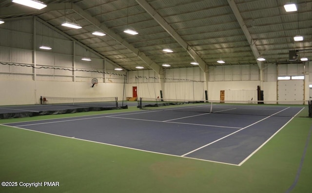 view of tennis court featuring community basketball court