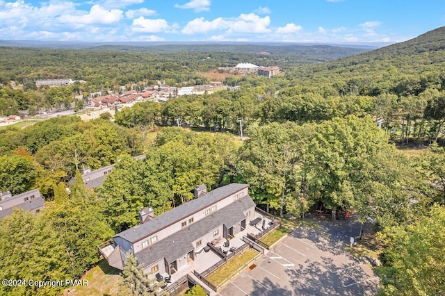 bird's eye view featuring a forest view