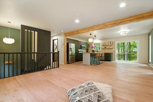 754 Clubhouse Dr, East Stroudsburg, PA 18302 - living area with light wood finished floors, beam ceiling, a chandelier, and recessed lighting