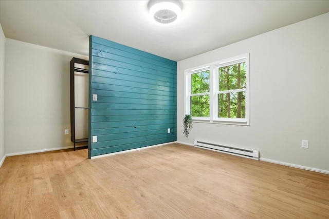 754 Clubhouse Dr, East Stroudsburg, PA 18302 - unfurnished room featuring a baseboard radiator and light wood-type flooring