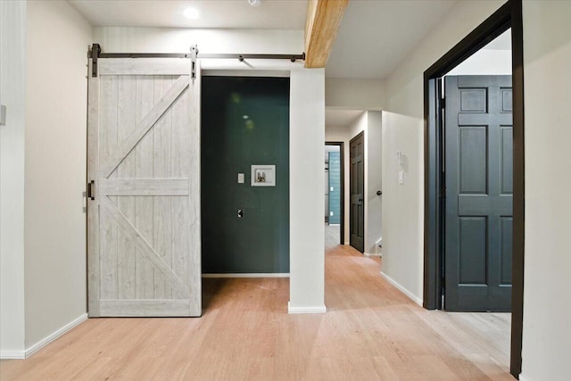 754 Clubhouse Dr, East Stroudsburg, PA 18302 - hallway featuring light wood-type flooring and a barn door