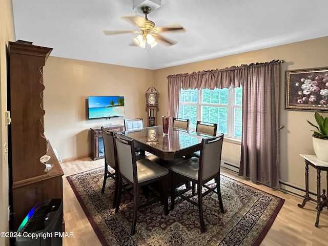 228 Wilbur Bloom Blvd, East Stroudsburg, PA 18302 - dining area with light wood-style flooring, ceiling fan, baseboards, and lofted ceiling