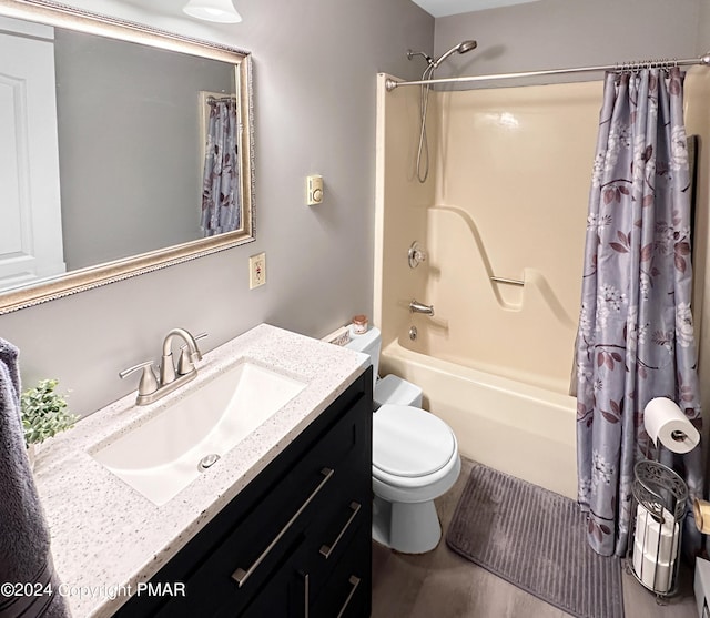 228 Wilbur Bloom Blvd, East Stroudsburg, PA 18302 - bathroom with toilet, shower / bathtub combination with curtain, and vanity