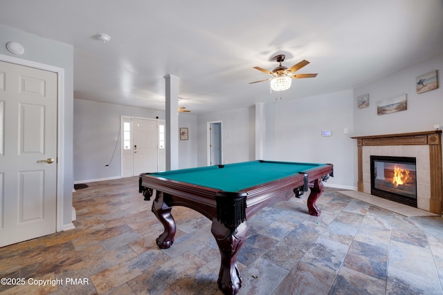 rec room with a fireplace, billiards, and ceiling fan